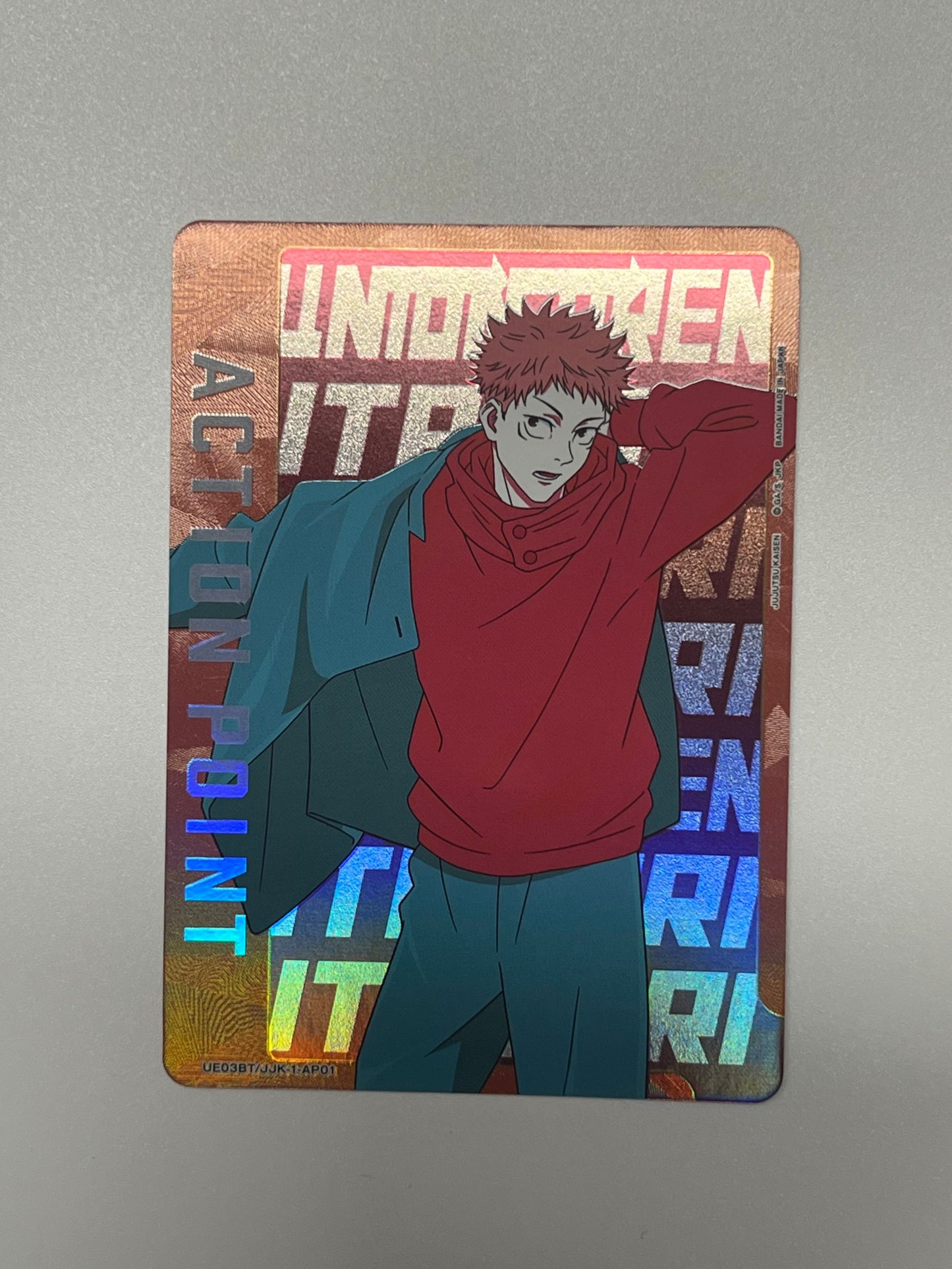 Yuji putting on a jacket with a orange background (Union Arena)