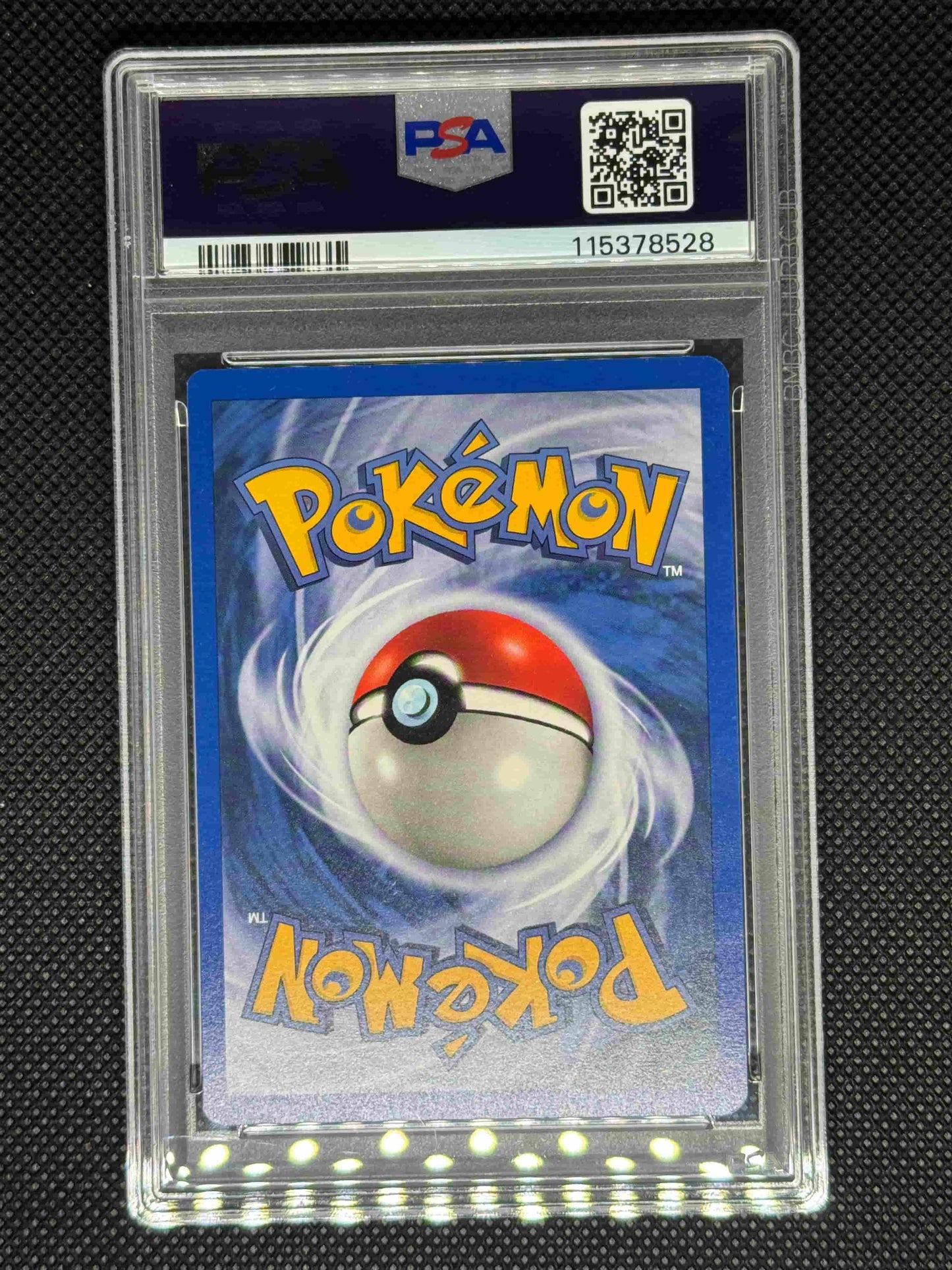 Pokémon trading card in a PSA protective case with its ID number and barcode and QR code.