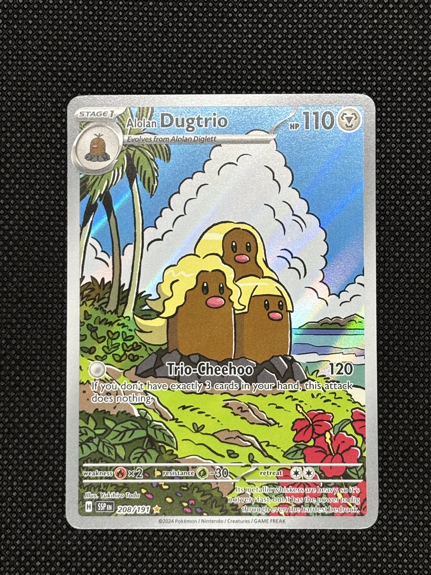 Alolan Dugtrio on a cliff side looking out into the ocean.