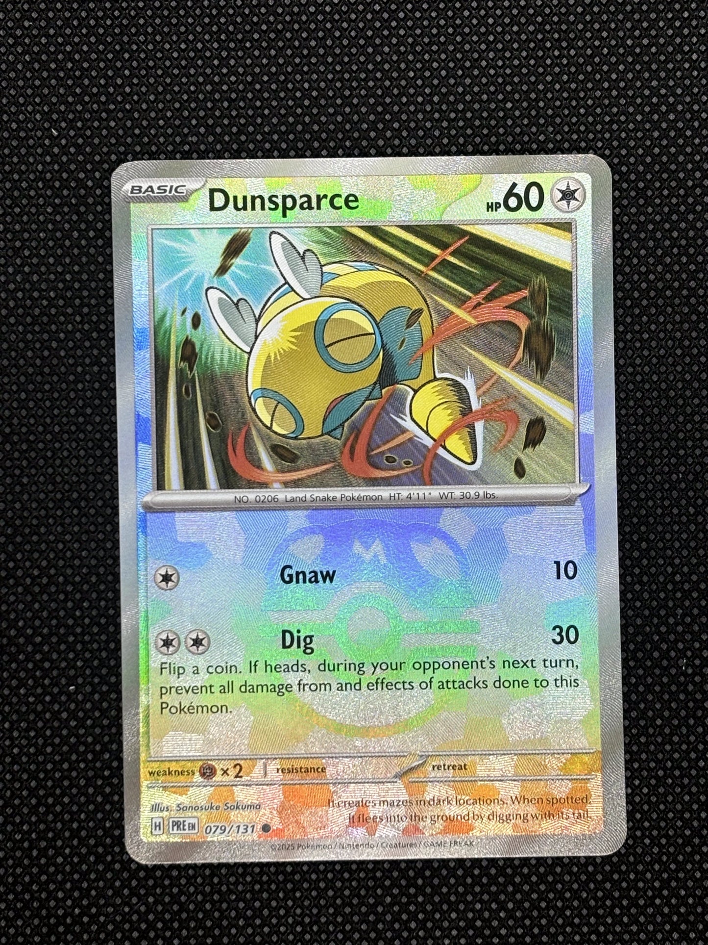 Dunsparce Masterball using its drill with flying rocks around it