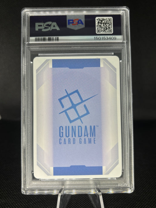 A PSA graded Gundam Card Game card in a clear PSA slab, displayed on a stand against a dark background. The card features a blue and white geometric design with the Gundam logo and text.