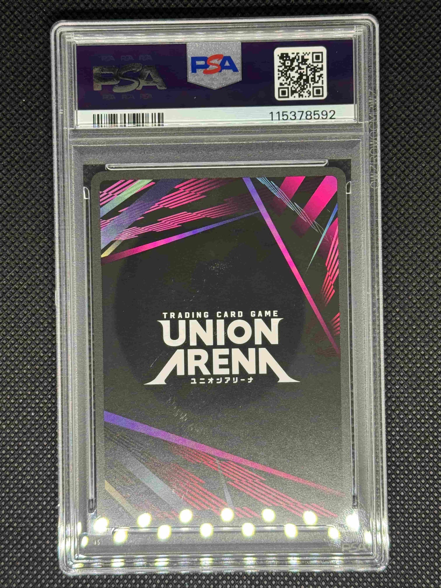 Trading card featuring 'The Union Arena' design in a PSA protective case.
