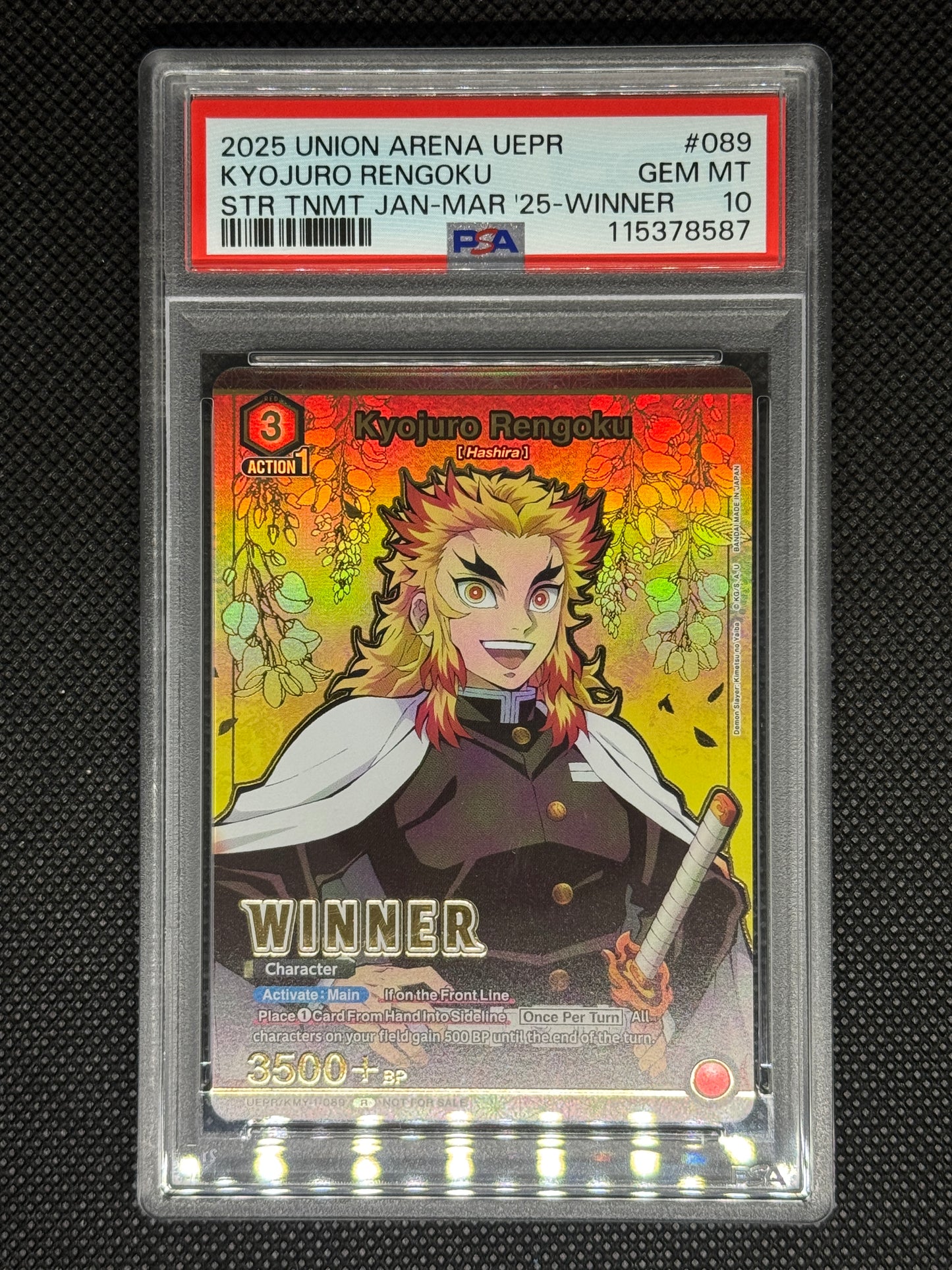 Trading card with anime character, Kyojuro Rengoku, in a protective case on a black background