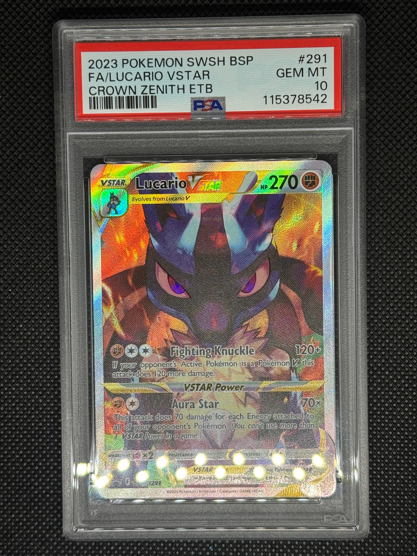 Lucario Vstar Promo from Crown Zenith ETB in a protective case with visible grading information.