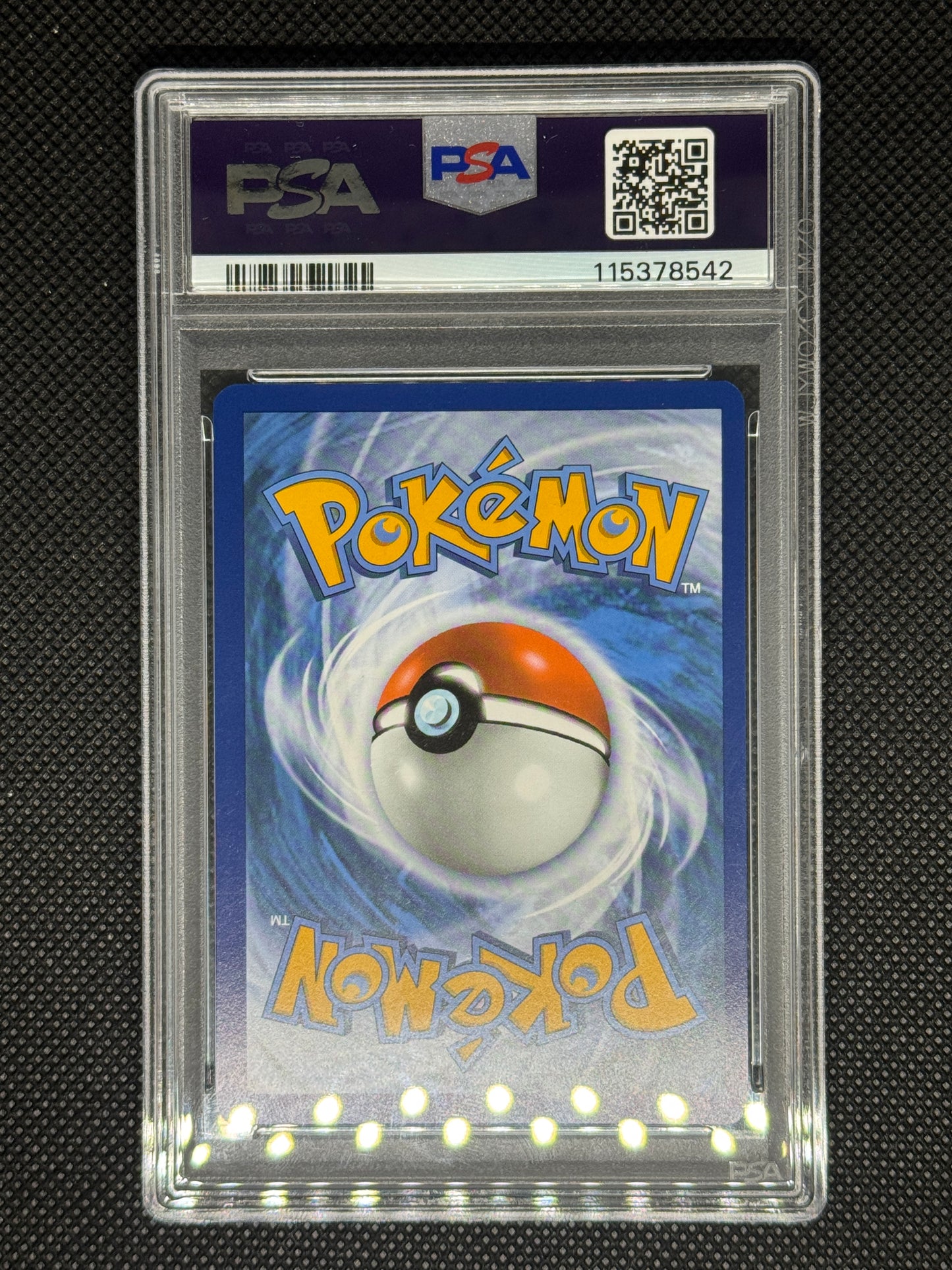 Lucario back with more grading information and barcode and QR code.