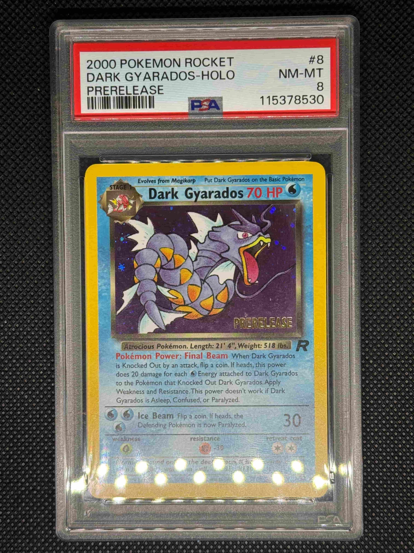Dark Gyarados prerelease from Pokemon Rocket in a PSA 9 slab with the set, card number, ID, and barcode.