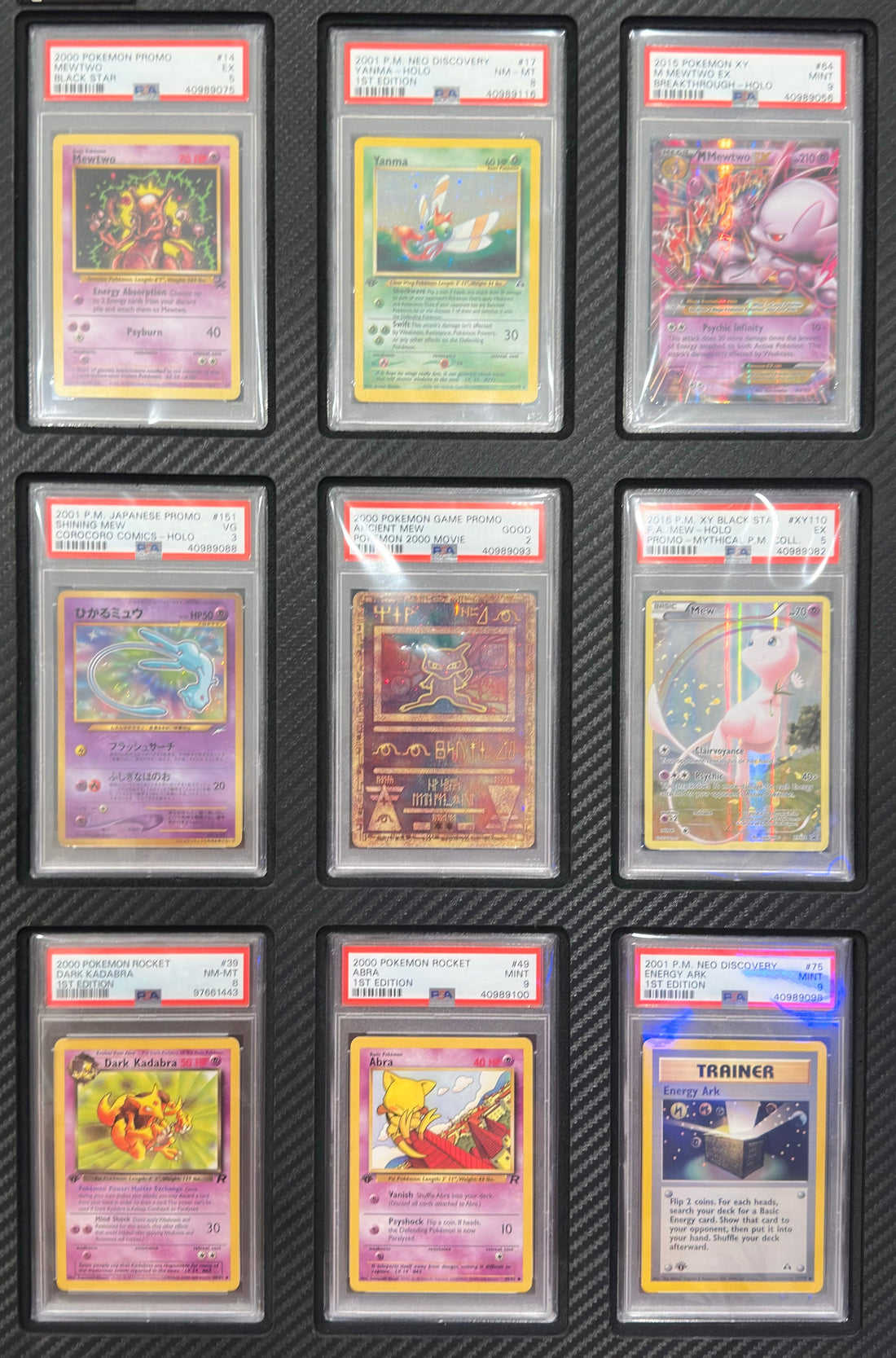 Nine PSA Graded Pokemon Cards with various grades.