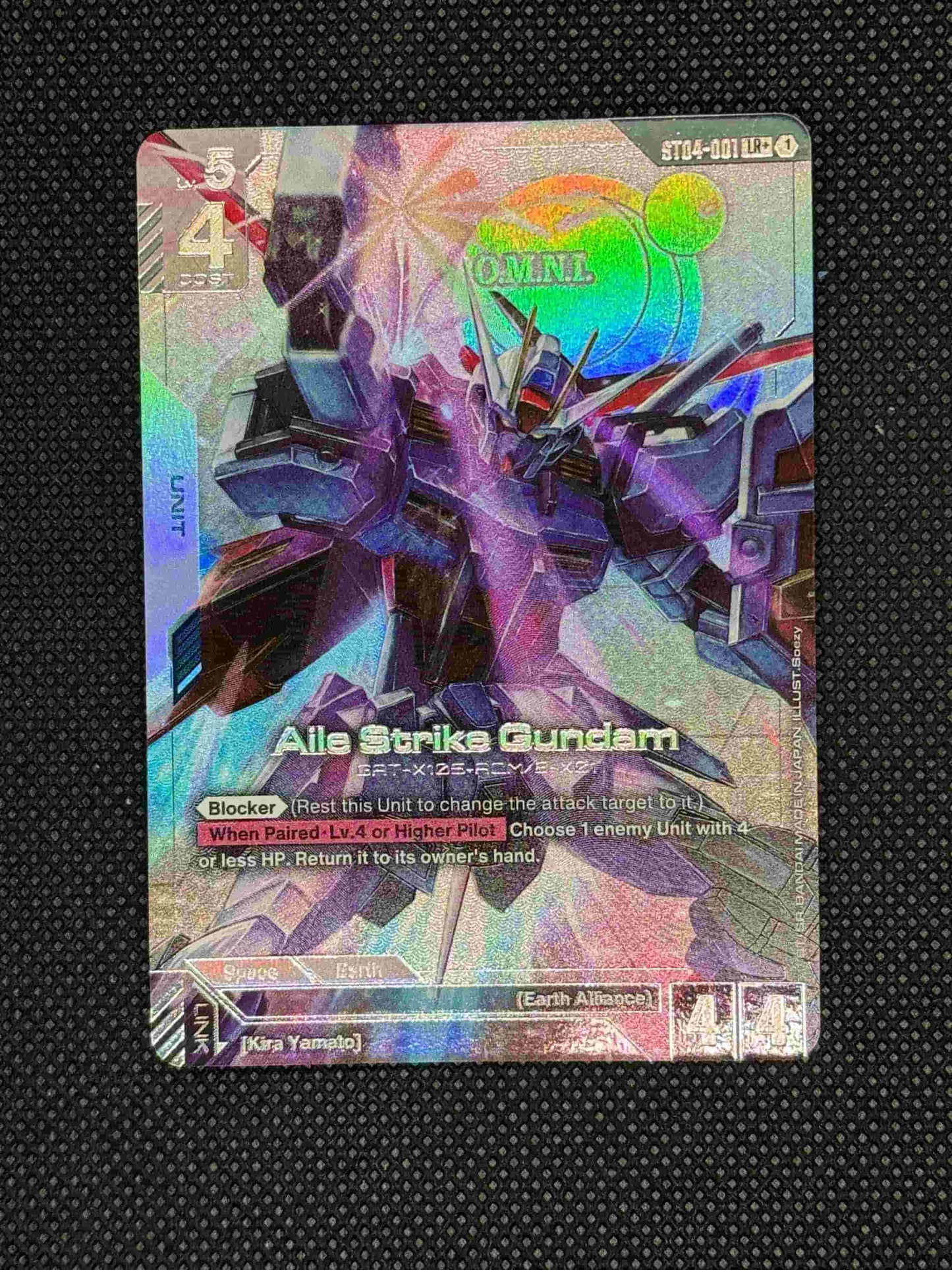 Holographic trading card featuring a robot design on a textured black background