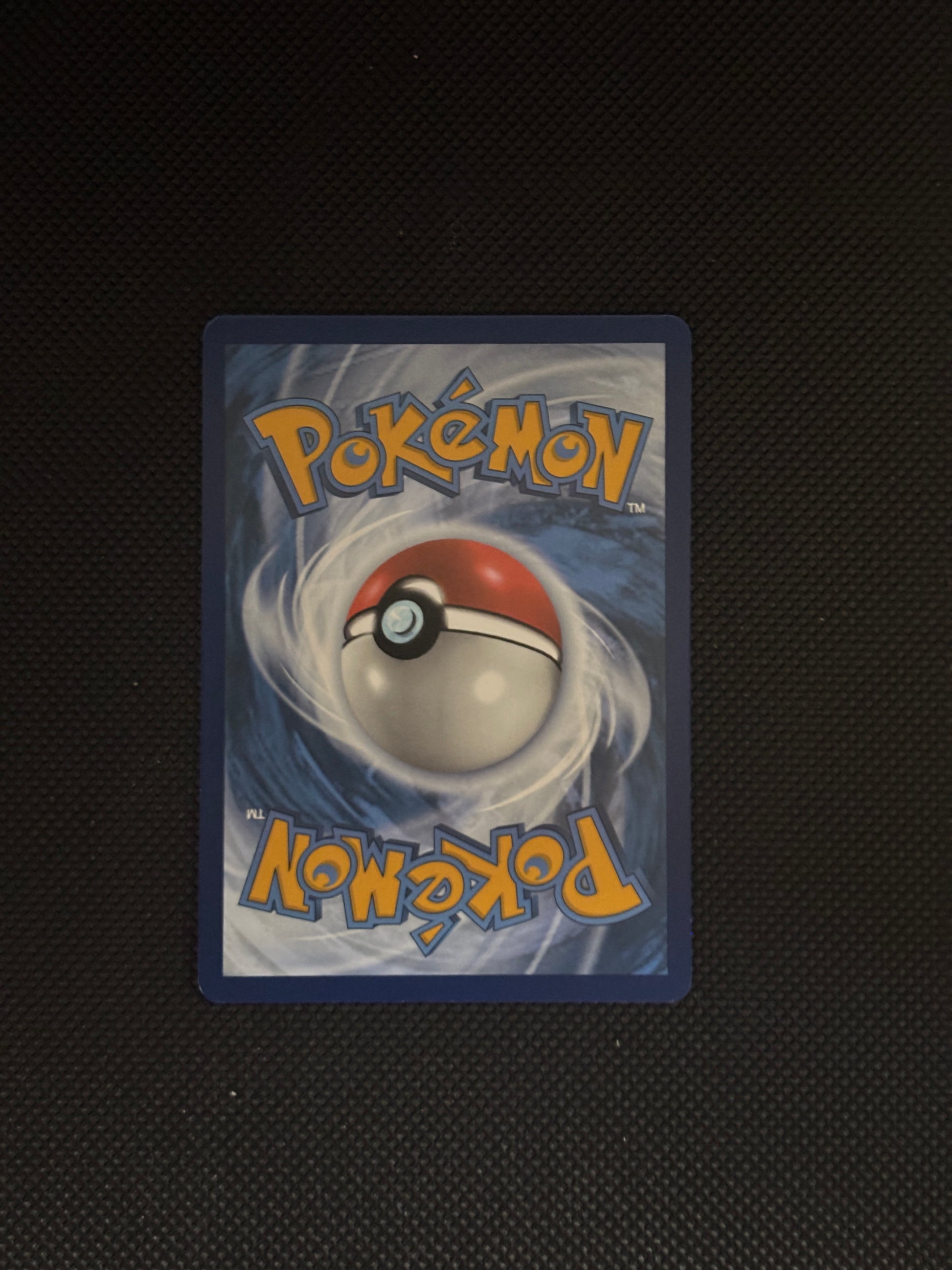 Pokemon logo with a blue background.