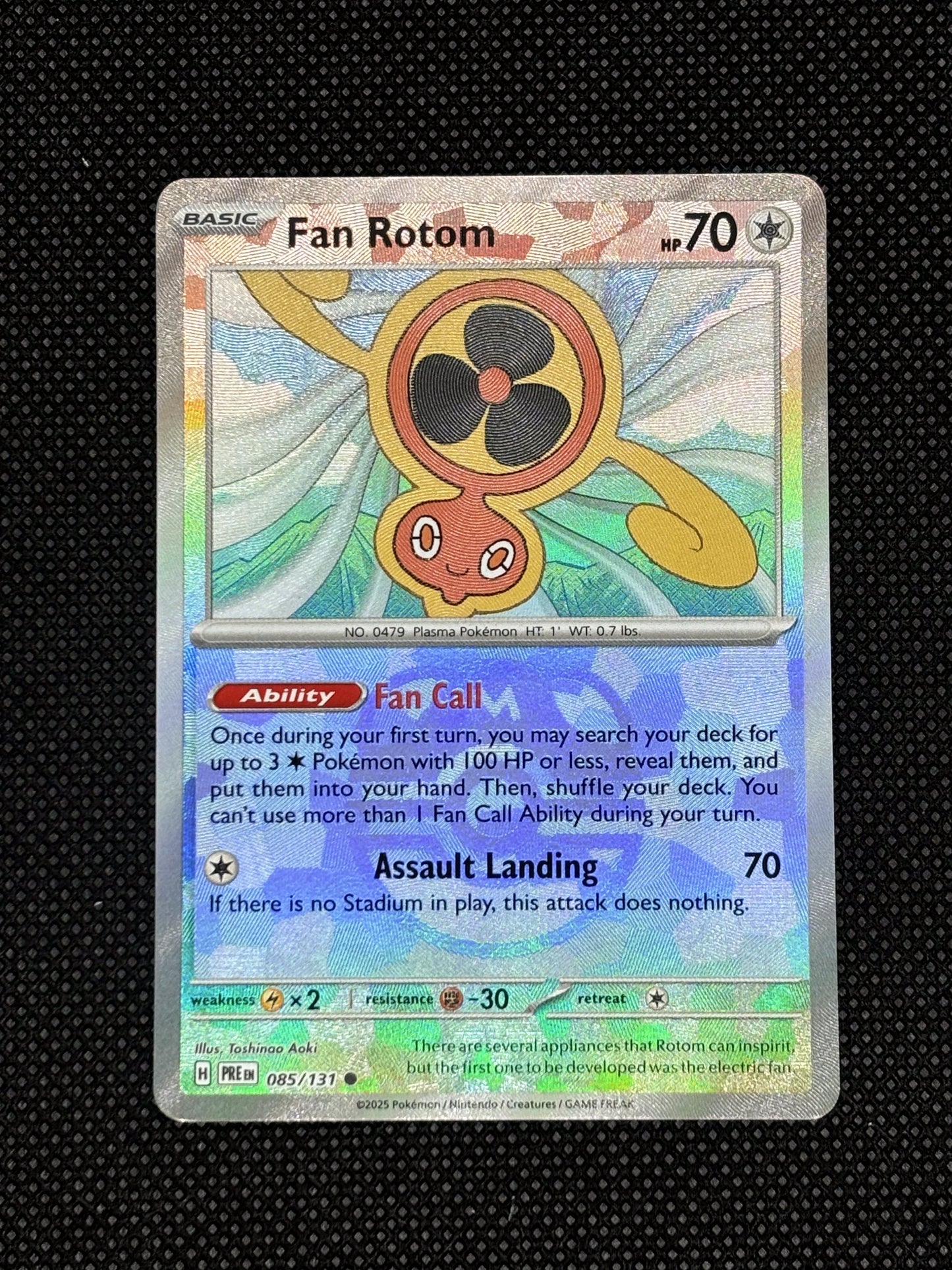 Fan Rotom blowing wind textured card with a masterball