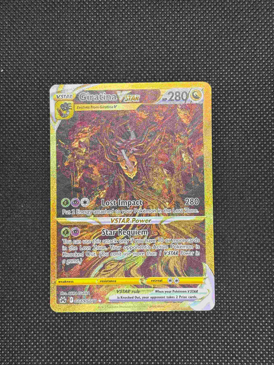 Giratina slithering down a tree with a lot of things hanging from the tree and a gold border and background.