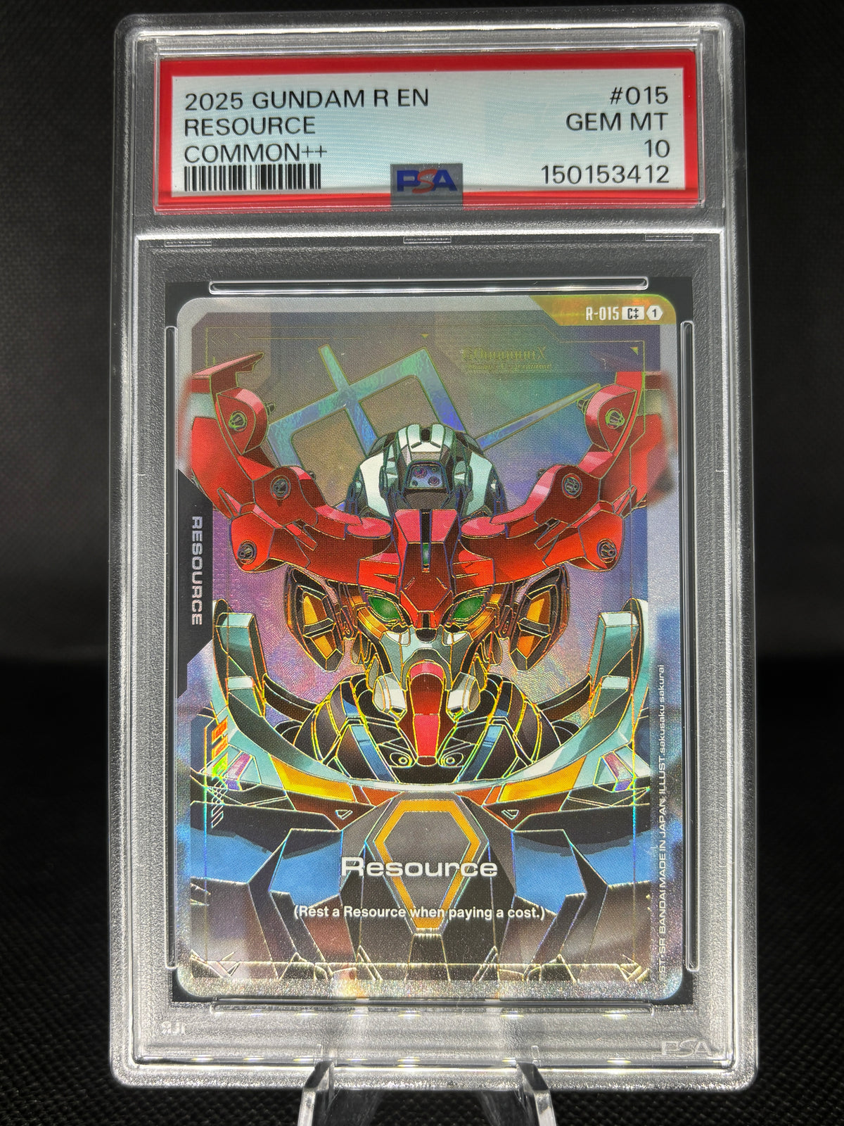 A PSA-graded collectible card of the 2025 Gundam R EN 'Resource' mecha, sealed in a clear plastic grading holder against a dark background.