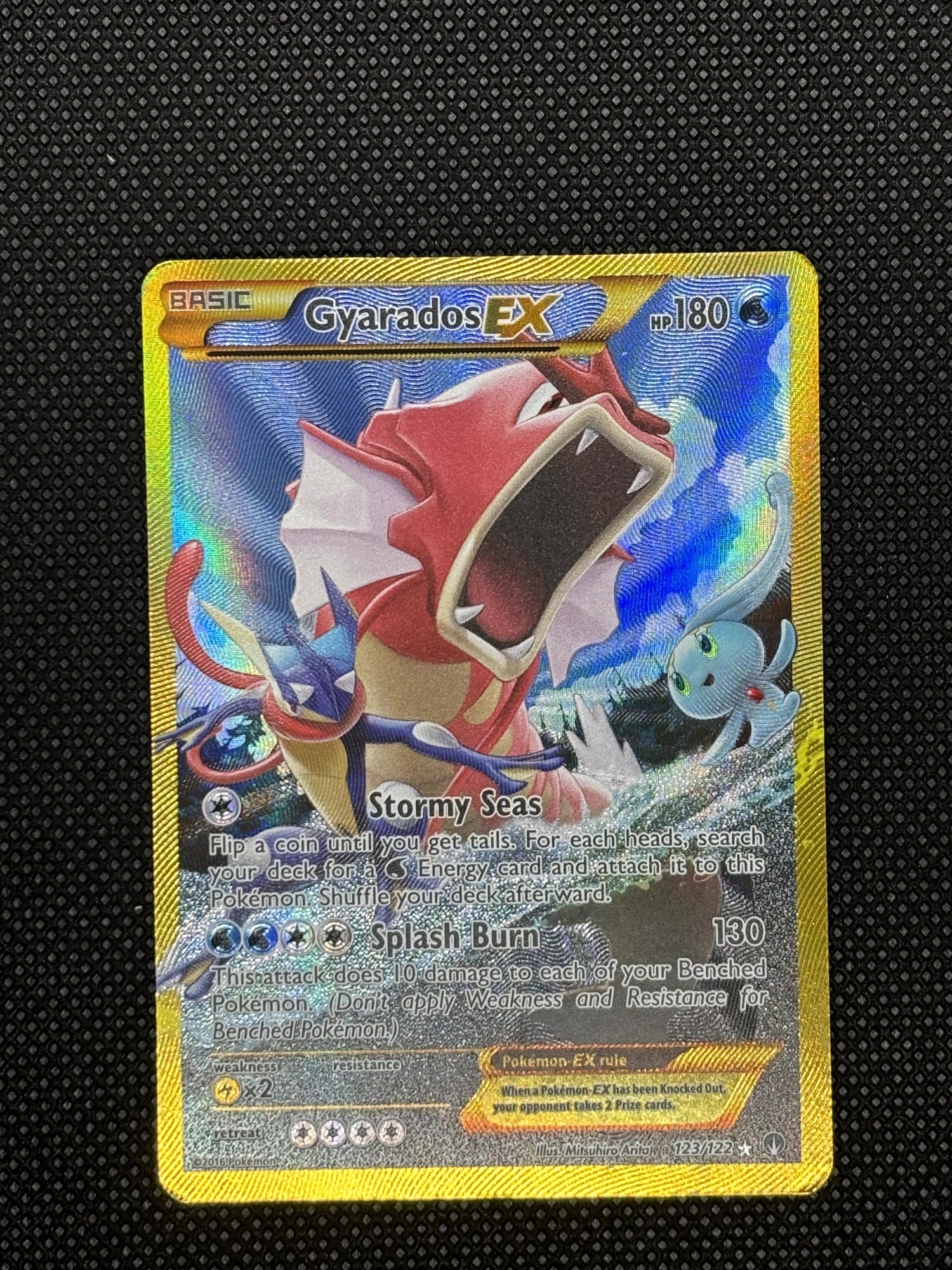 Red Gyarados with a Manaphy and Greninja, Gold Border
