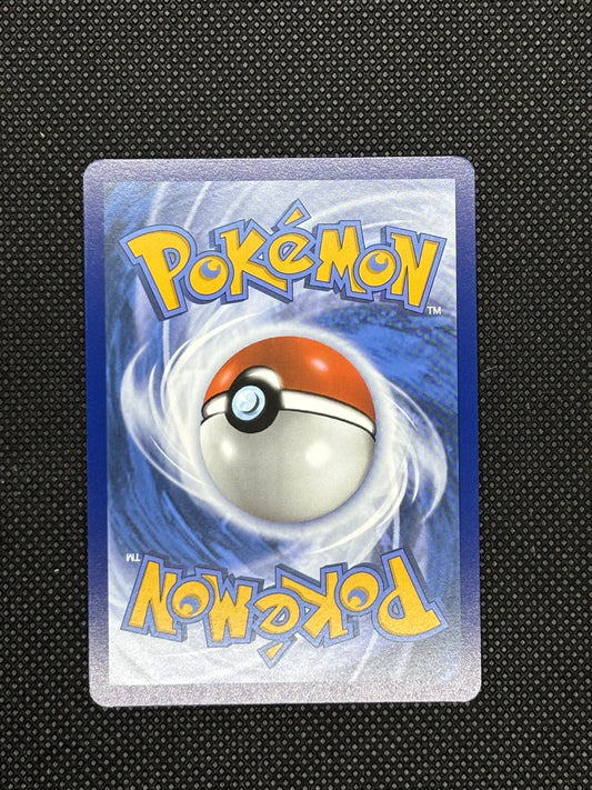 Hearthflame Mask Ogerpon EX from Prismatic Evolutions with a blue background and a pokeball