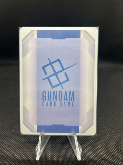 Gundam card game packaging with clear plastic holder on a dark textured background