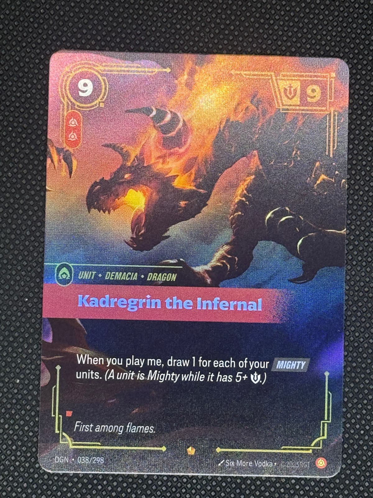 Trading card featuring a dragon with game text on a textured black background