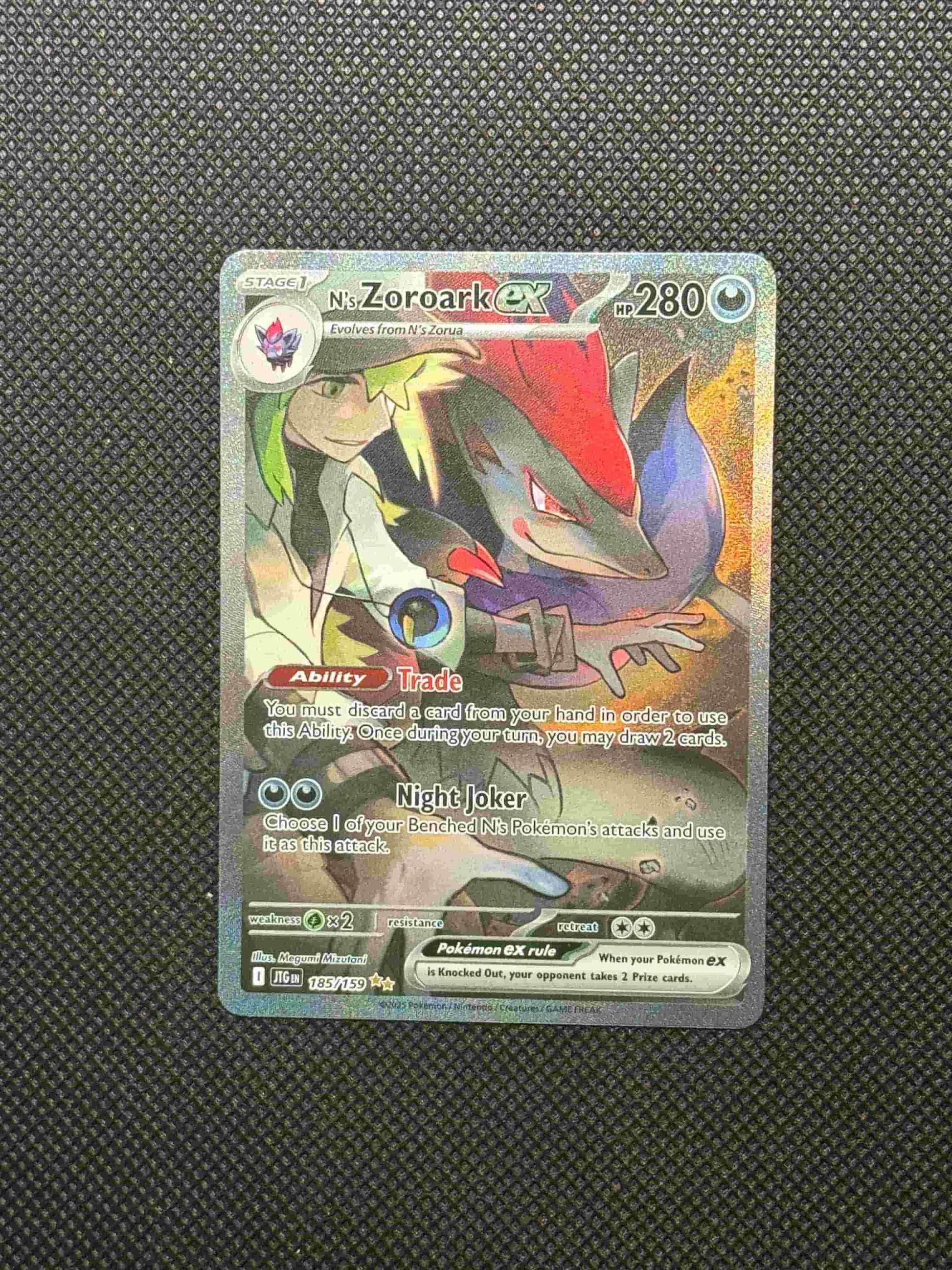 N in front of zoroark