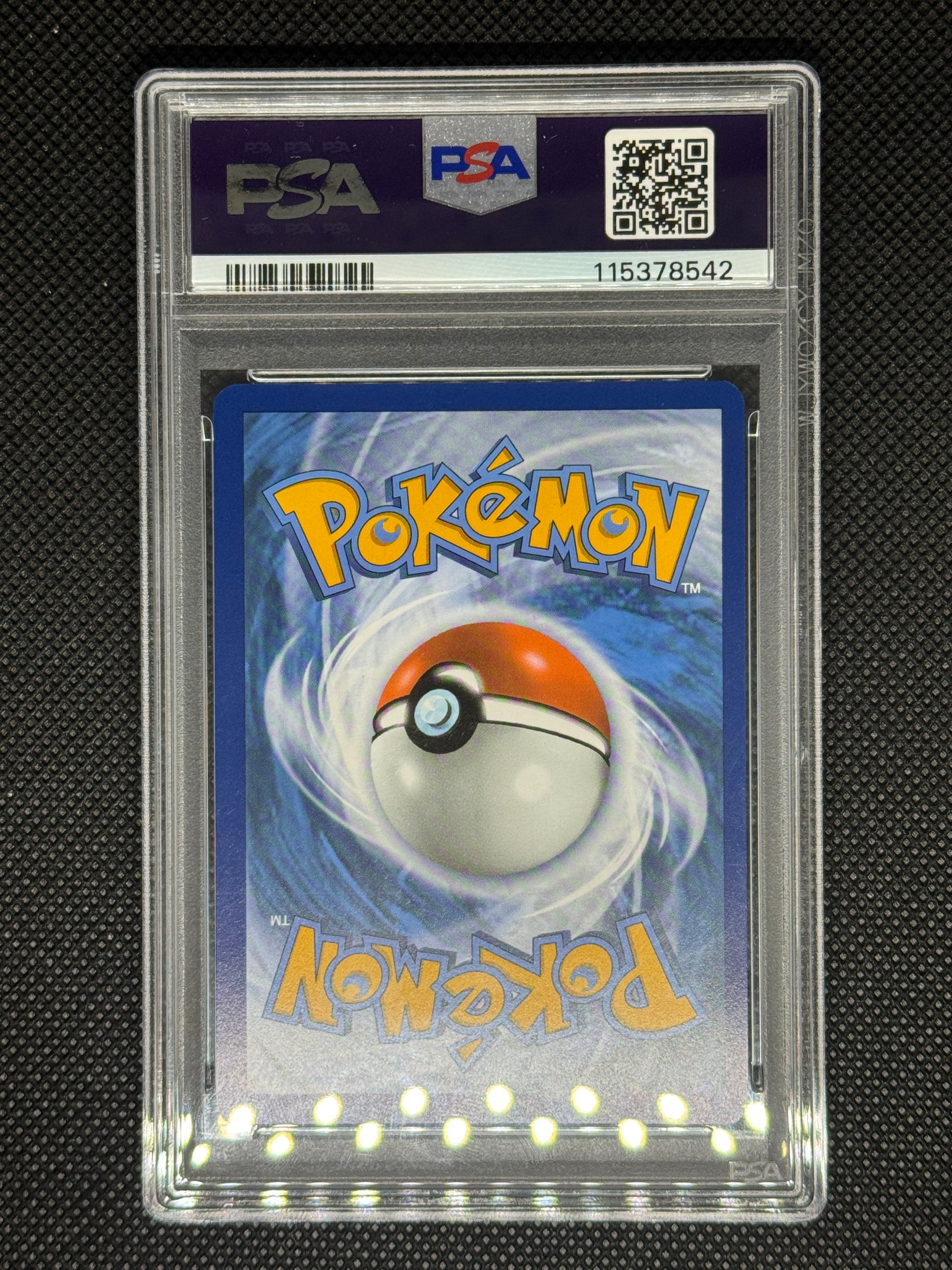 Lucario back with more grading information and barcode and QR code.