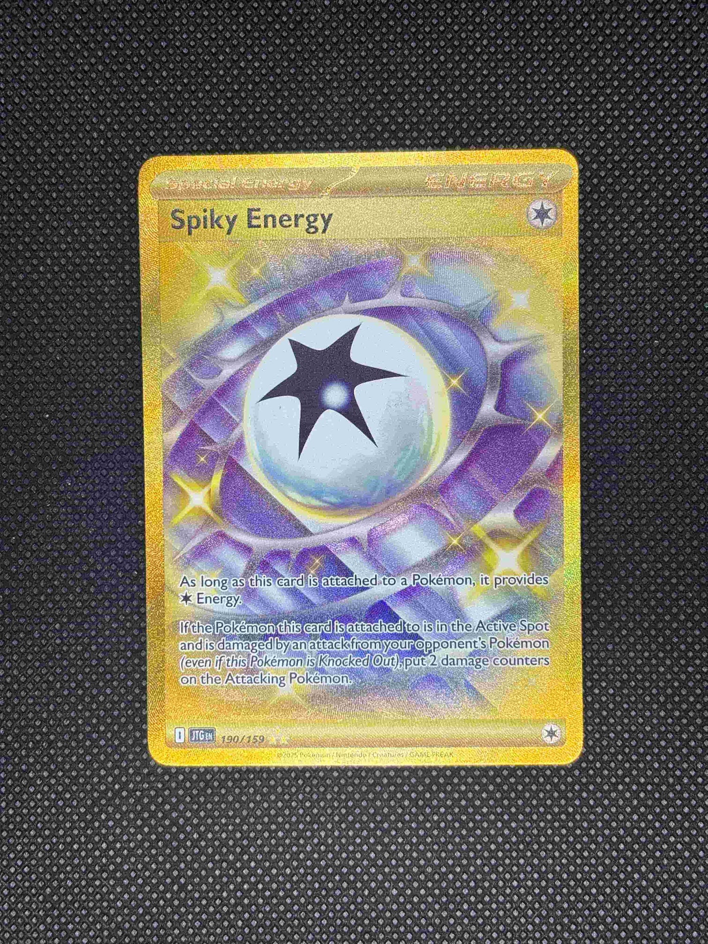 colorless energy with spikes around it and a gold border.