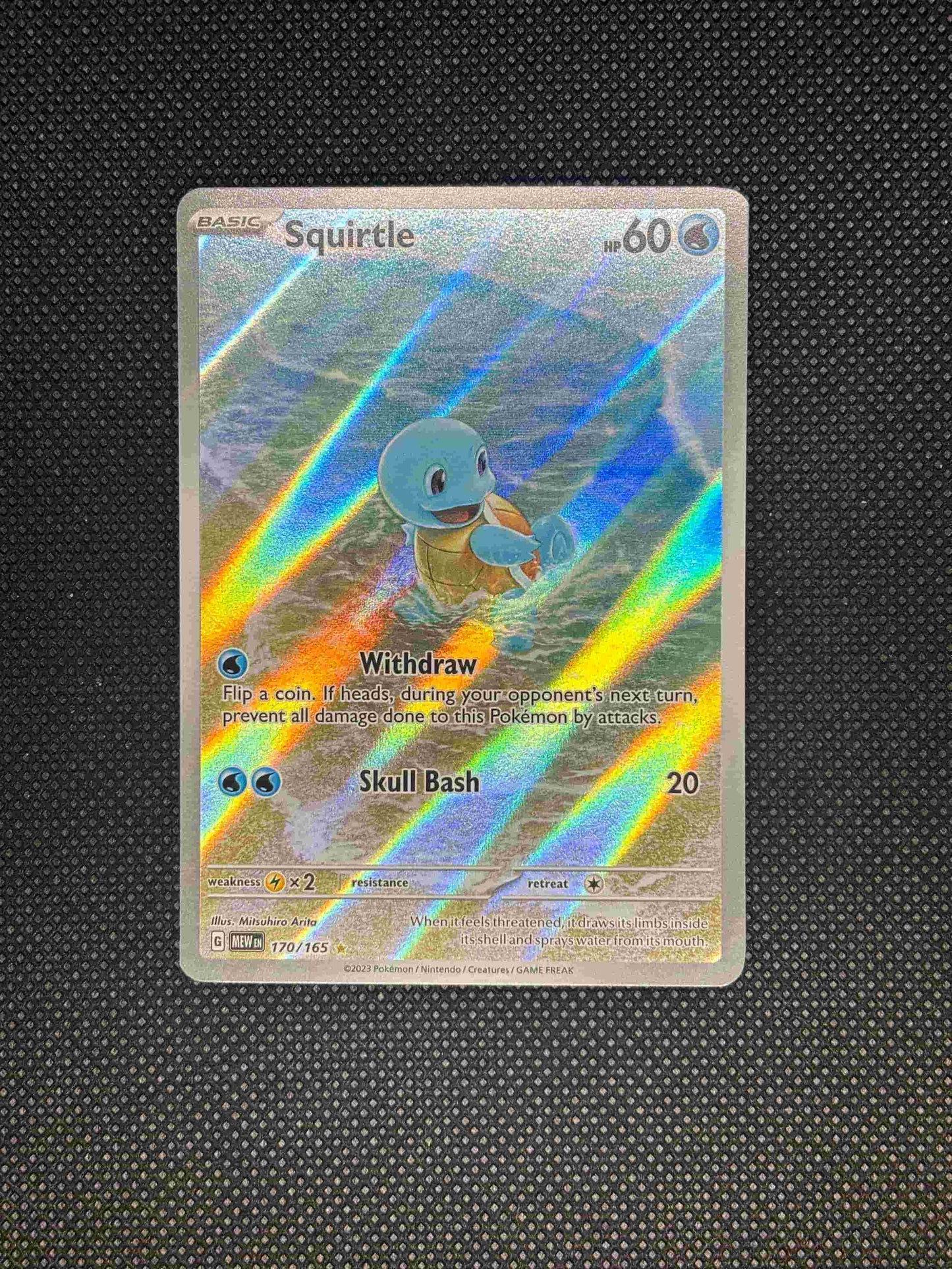 Squirtle on the beach playing with the water as a wave comes in.