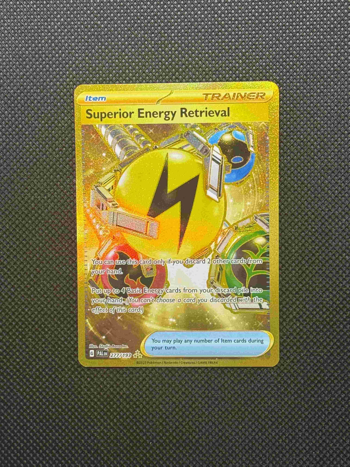 lighting, grass, water, and fire energy being pulled by mechanical arms with a gold background and boarders.