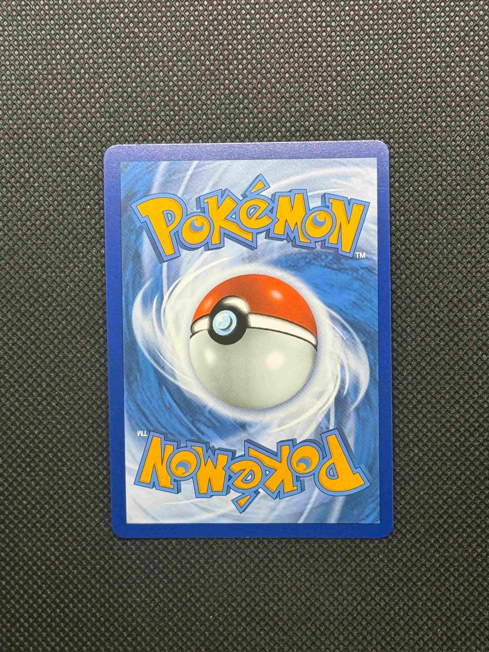 pokemon logo with blue, yellow, and red. With a pokeball and swirls in the back.