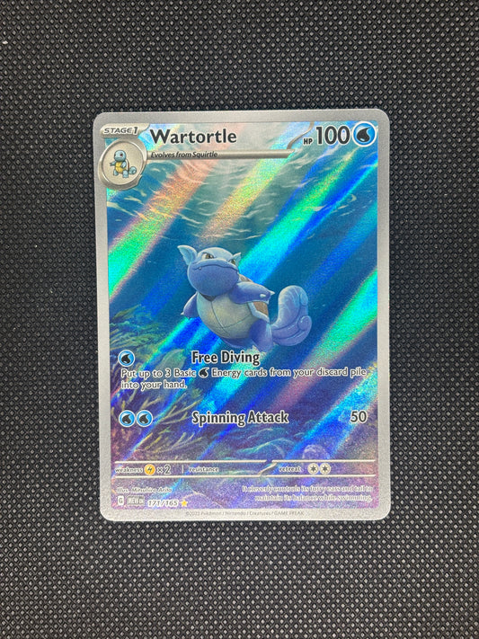 Wartortle swimming in the sea next to a coral reef as rays of sunshine come through the water.