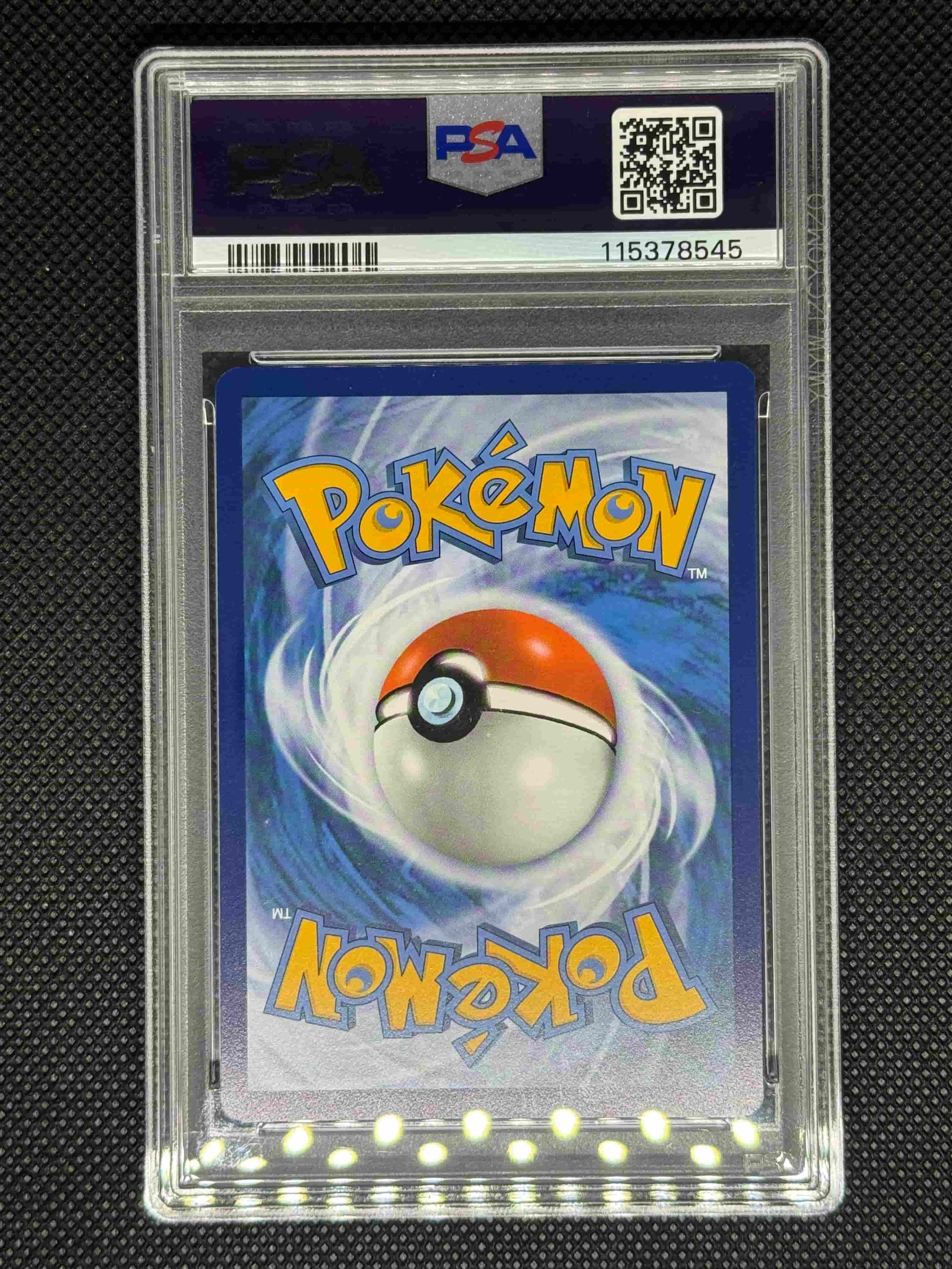 Pokémon trading card in a protective case with a visible PSA logo, barcode, QR code, and ID number.