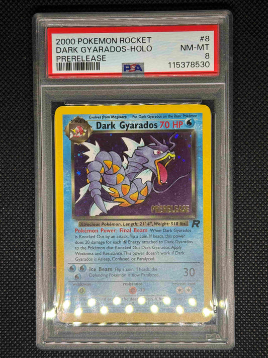 Dark Gyarados prerelease from Pokemon Rocket in a PSA 9 slab with the set, card number, ID, and barcode.