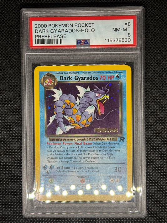 Dark Gyarados prerelease from Pokemon Rocket in a PSA 9 slab with the set, card number, ID, and barcode.