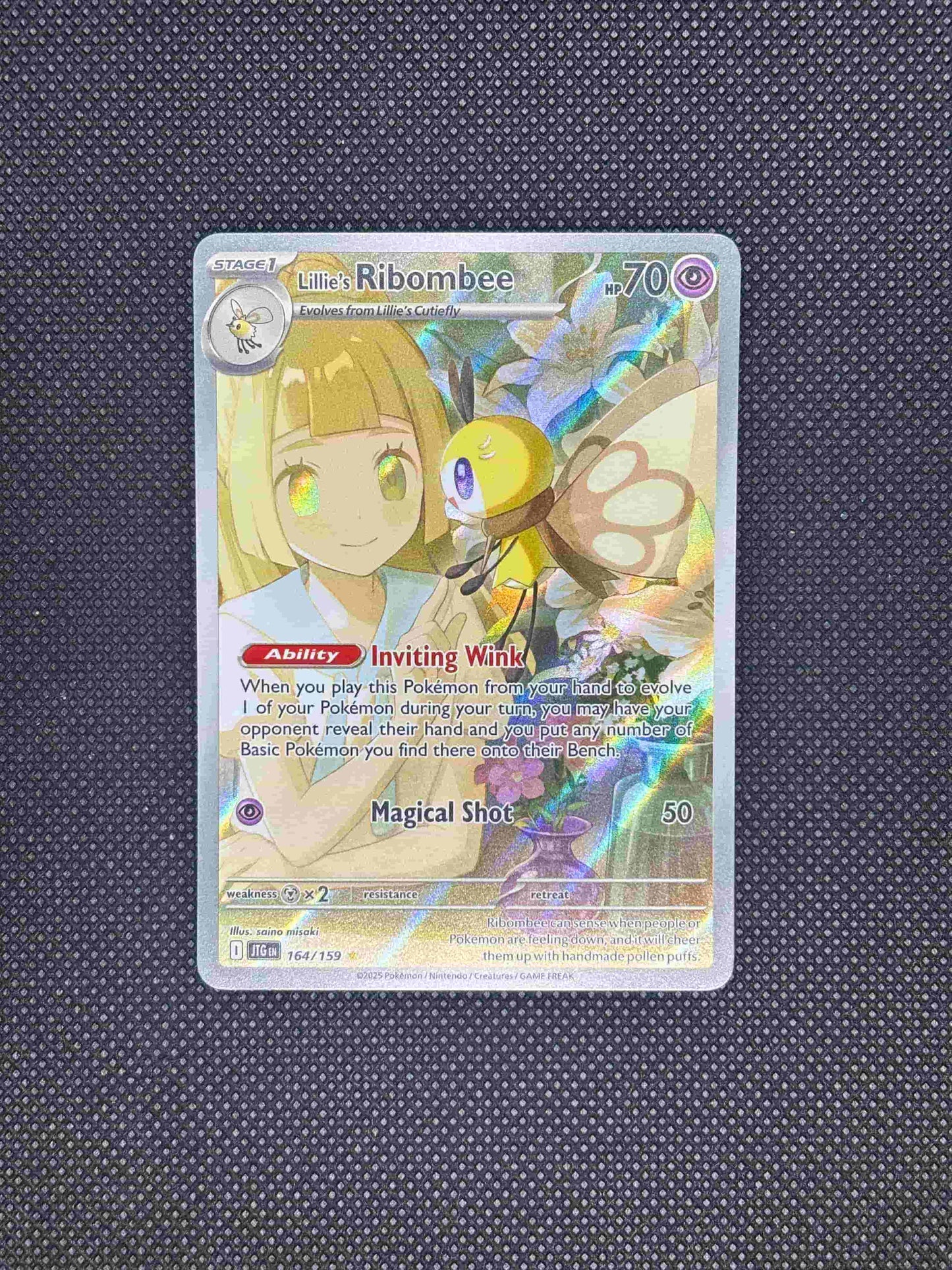 lillie holding hands with ribombee as they are surrounded with flowers.