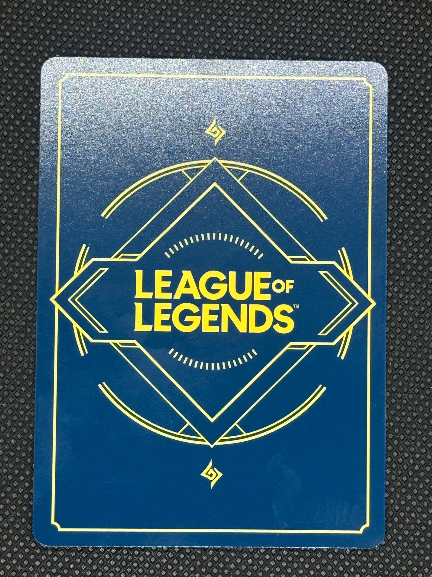 League of Legends card with gold text on a blue background