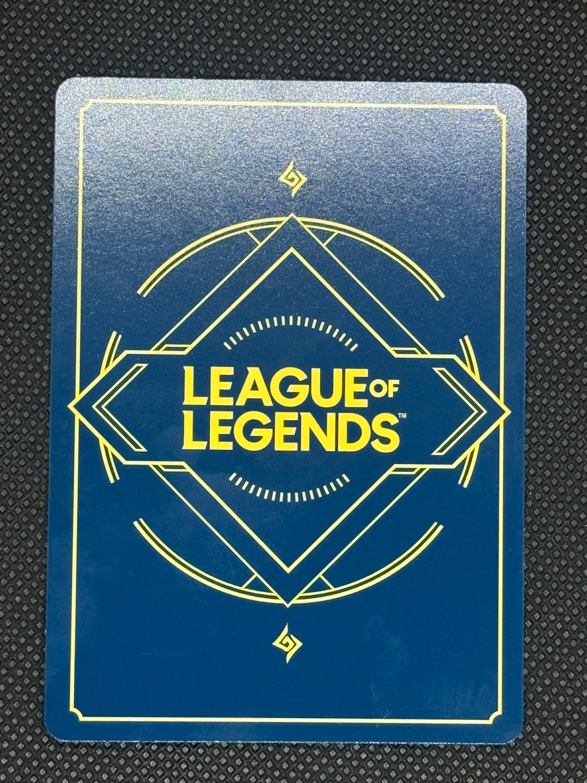 League of Legends card with gold text on a blue background